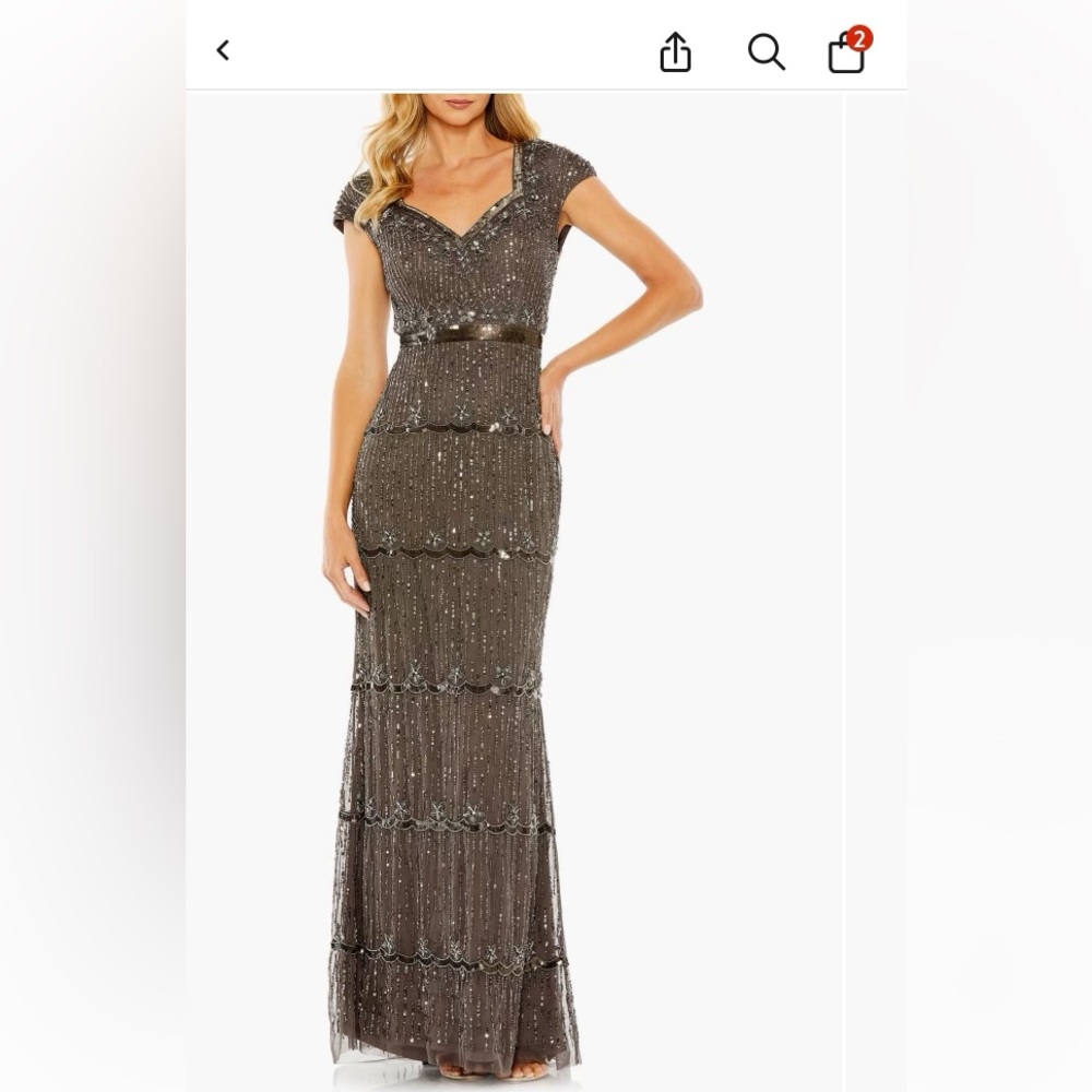 Beautiful charcoal, gray beaded evening gown with capped sleeves